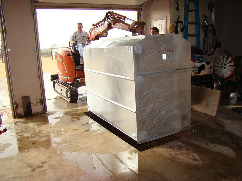 Steel shelter being set in a garage